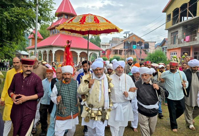Devotees carrying Chhari Mubarak of annual Kailash Yatra from Bhaderwah on Wednesday. —Excelsior/Tilak Raj Devotees carrying Chhari Mubarak of annual Kailash Yatra from Bhaderwah on Wednesday. —Excelsior/Tilak Raj