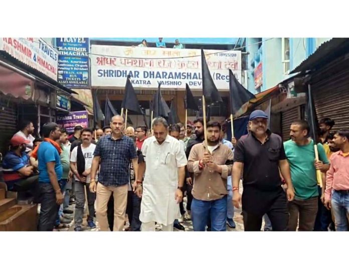 Mata Vaishno Devi Baridars taking out protest march at Katra on Saturday.