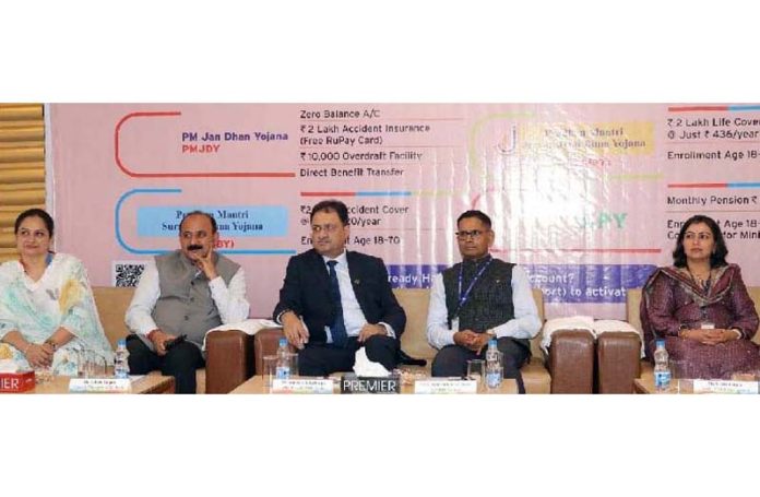 J&K Bank and RBI dignitaries during a financial literacy camp at Satwari on Friday.