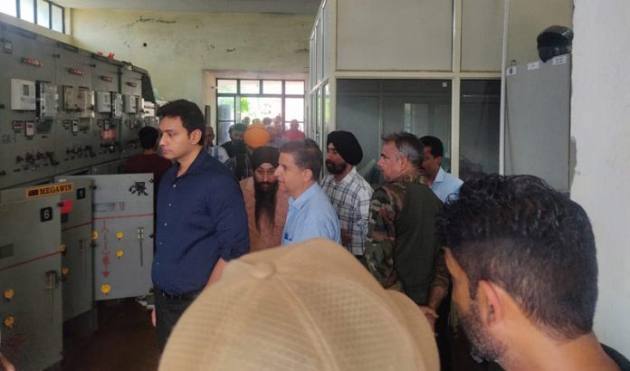 DC Jammu inspecting power receiving station at Greater Kailash on Thursday.