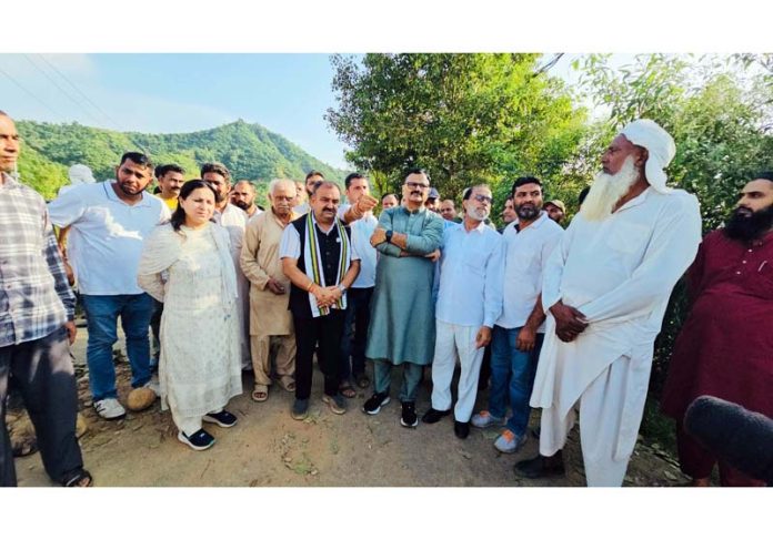 Minister, Javed Ahmed Rana visiting flood-affected village of Jammu on Friday.