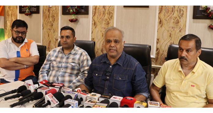 Deepak Gupta, president of Traders Federation Ware House-Nehru Market (Jammu) addressing a press conference. -Excelsior/Rakesh Deepak Gupta, president of Traders Federation Ware House-Nehru Market (Jammu) addressing a press conference. -Excelsior/Rakesh