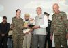 Lt Governor Ladakh, Kavinder Gupta honouring army officers at a function on Saturday.