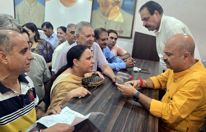 BJP MLA Jammu East, Yudhvir Sethi during a public darbar at Kacchi Chawni party office on Thursday. BJP MLA Jammu East, Yudhvir Sethi during a public darbar at Kacchi Chawni party office on Thursday.