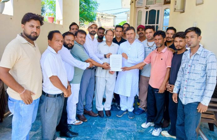 Kathua artists giving a memorandum to MLA Dr Bharat Bhushan on Thursday.