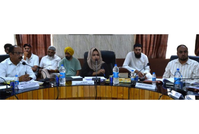 DDC Poonch Chairperson chairing a meeting on Friday.