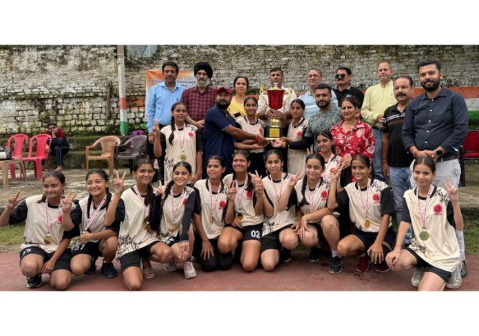 Winning team posing along with dignitaries. Winning team posing along with dignitaries.