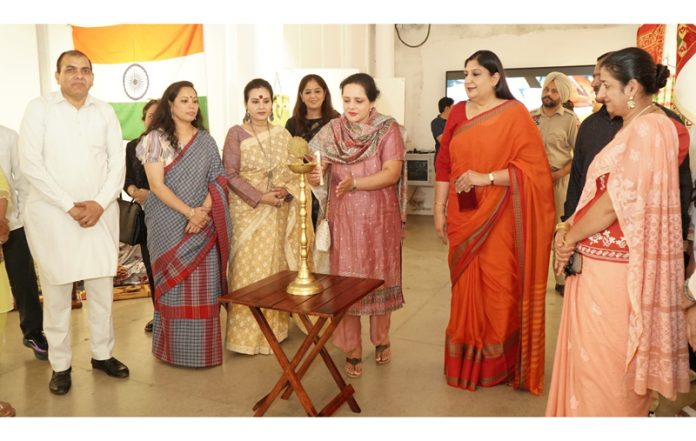 Dr Kanu Thind, Director NIIFT lighting the traditional lamp during an event on Friday.