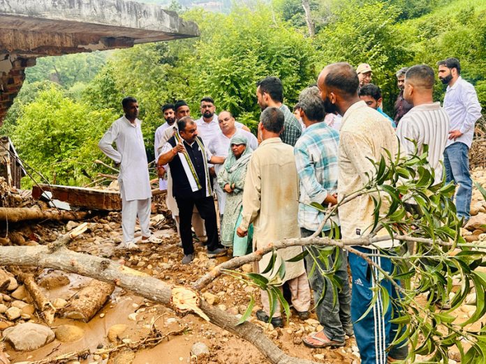 MLA Bahu, Ch Vikram Randhawa during visit to landslide hit area of Bermini on Friday.