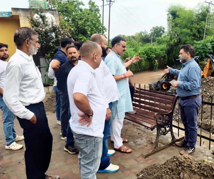 BJP leader Sanjay Kumar Baru during visit to flood affected area in Talab Tillo.