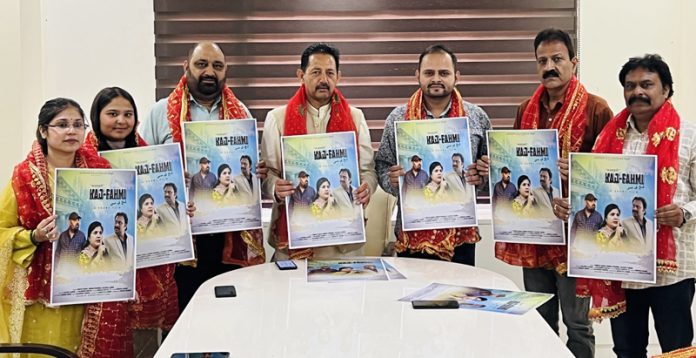 BJP general secretary, Baldev Singh Billawaria releasing poster of Kaj Fahmi at Jammu on Thursday. BJP general secretary, Baldev Singh Billawaria releasing poster of Kaj Fahmi at Jammu on Thursday.