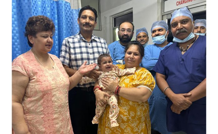 Doctors posing with an 8-month-old infant on whom they performed rare vascular malformation surgery at Swami Vivekanand Hospital, Jammu. Doctors posing with an 8-month-old infant on whom they performed rare vascular malformation surgery at Swami Vivekanand Hospital, Jammu.