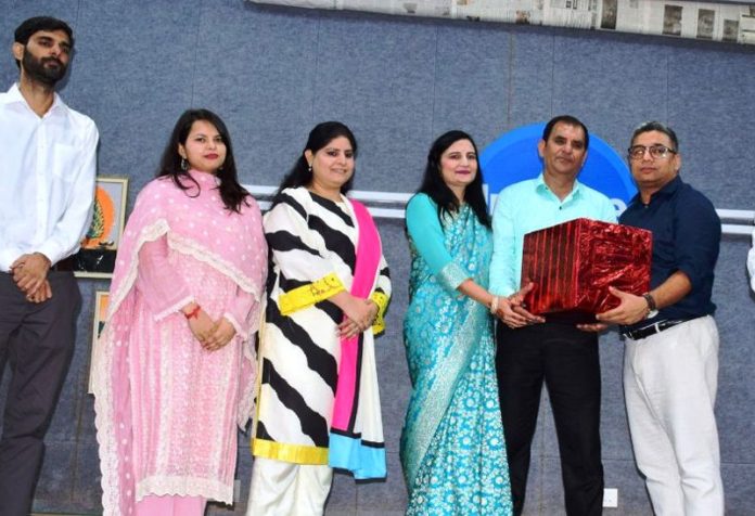 Officers presenting gift to retiring official.