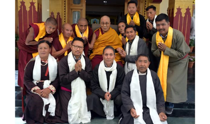 Delegation from Matho Gonpa and Matho village posing along with Dalai Lama on Thursday.