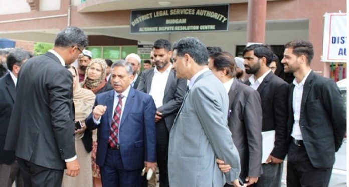 Justice Sanjeev Kumar during inspection of District Court Complex at Budgam.