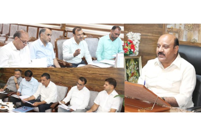 DyCM Surinder Choudhary chairing a meeting at Srinagar on Monday.