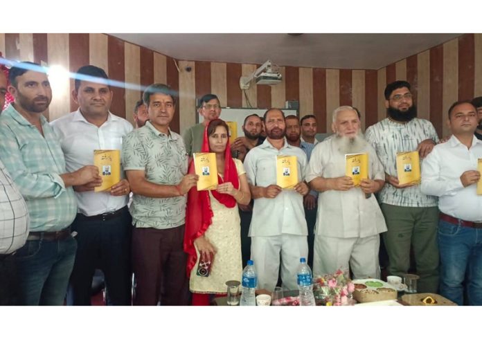 Urdu writer Abdul Khaliq releasing a book in Jammu.