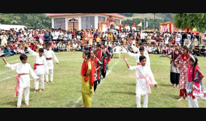 Students performing during Sankri Mela on Wednesday.