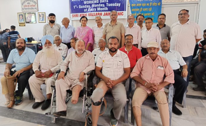 Members of Jain community along with beneficiaries of free artificial limbs camp at Shri Atam Vallabh Jain Clinic, Jammu.