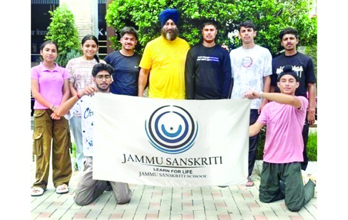 Jammu Sanskriti School athletes along with coach posing for a group photograph. Jammu Sanskriti School athletes along with coach posing for a group photograph.