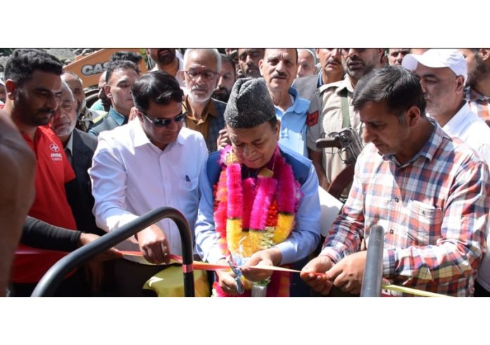 Speaker, Abdul Rahim Rather inaugurating macadamization works on vital road connecting Chadoora to Brenwar.