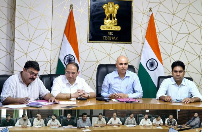 : DDC Pankaj Kumar Sharma chairing a meeting on Tuesday.