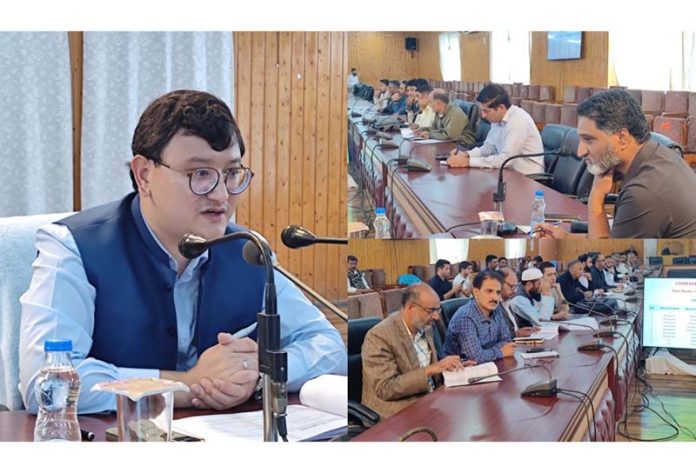 DC Baramulla chairing a meeting on Monday.
