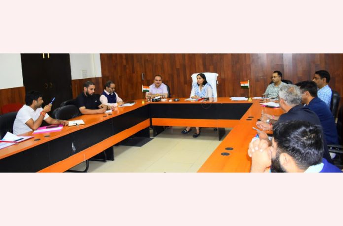 DC Reasi Nidhi Malik chairing a meeting on Monday.