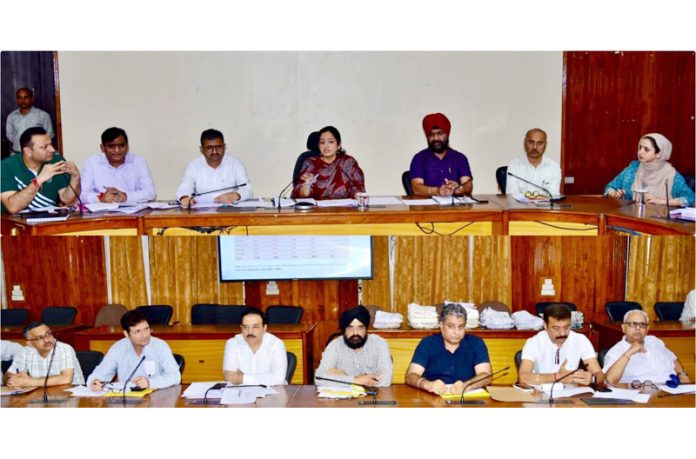 DC Saloni Rai chairing a meeting to review relief measures in Udhampur District.
