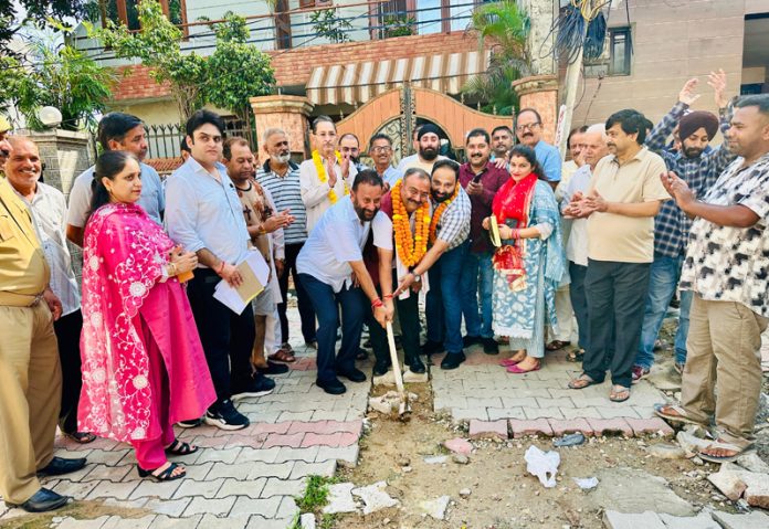 MLA Bahu Vikram Randhawa kick starting construction work of lane and drain at Nanak Nagar on Tuesday