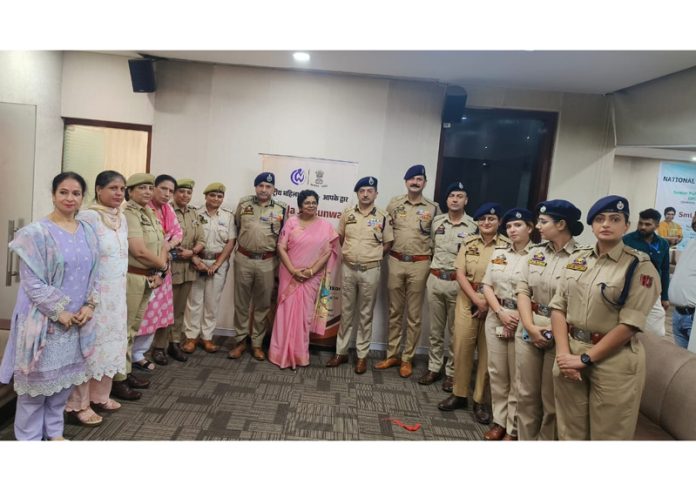DIG JSK Range, Shiv Kumar Sharma, along with other police officers and NCW Chairperson Vijaya Rahatkar in Jammu on Friday.