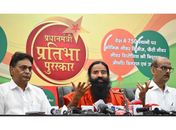 Swami Ramdev of Patanjali Yogpeeth addressing a press conference at Delhi on Wednesday. Swami Ramdev of Patanjali Yogpeeth addressing a press conference at Delhi on Wednesday.