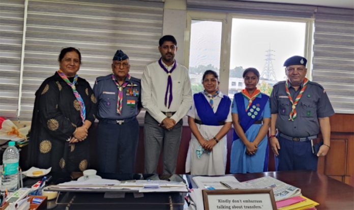 J&K Bharat Scouts & Guides team posing along with Director School Education Jammu, Naseem Javaid Choudhary.