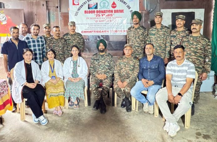Army officials and doctors from GMC Rajouri posing together during a blood donation camp at Manjakote. Army officials and doctors from GMC Rajouri posing together during a blood donation camp at Manjakote.