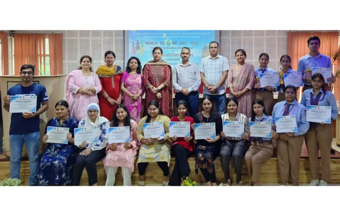 Students posing along with dignitaries during a programme. Students posing along with dignitaries during a programme.