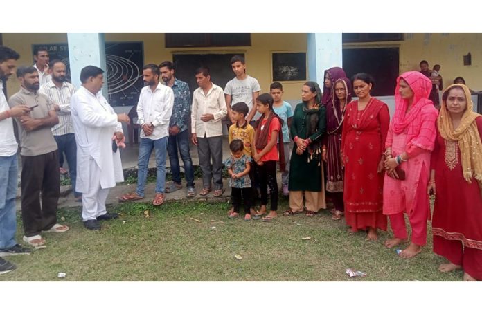 Ex-MLC Ravinder Sharma during visit to flood/rain hit areas of Sunderbani.