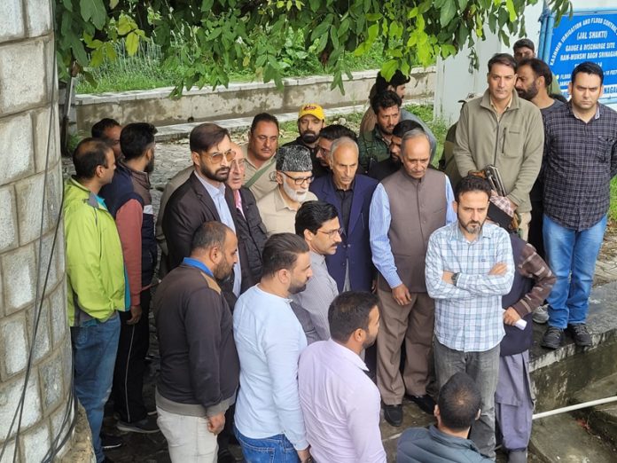 NC leader Ali Muhammad Sagar conducting an inspection of the River Jhelum bunds in Srinagar. NC leader Ali Muhammad Sagar conducting an inspection of the River Jhelum bunds in Srinagar.