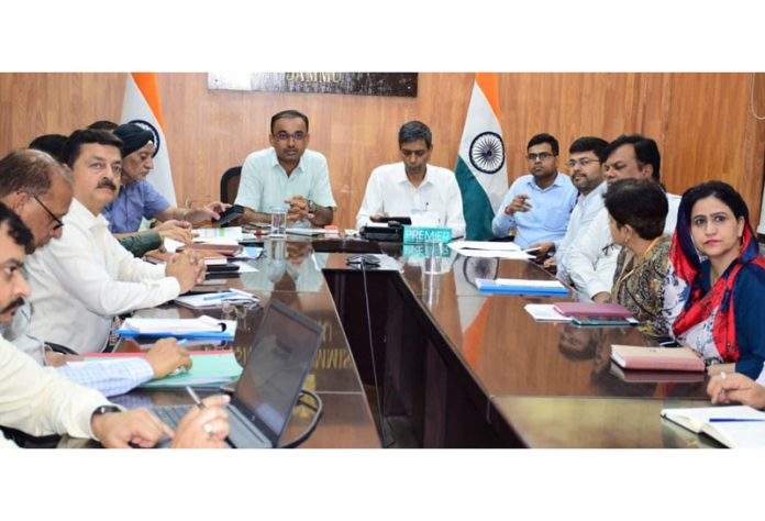 Div Com and Joint Secy NDMA chairing a meeting.