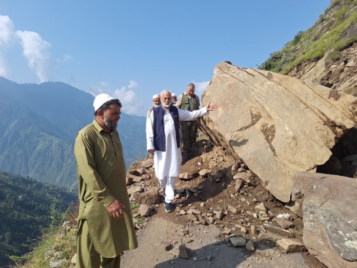 Senior Cong leader G M Saroori during visit to rain and landslide-hit area of Kishtwar.