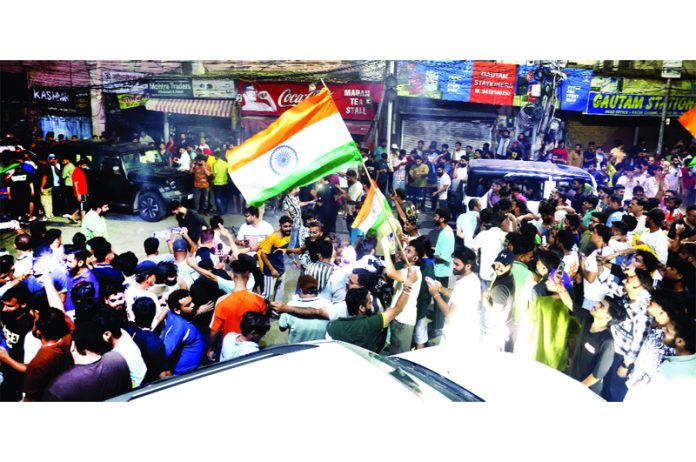 People celebrating in Jammu after India’s thrilling victory over Pakistan in Asia Cup final at Dubai on Sunday. -Excelsior/Rakesh