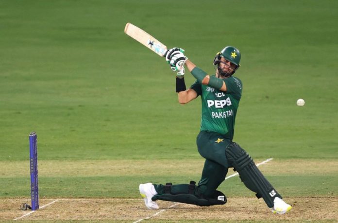Shaheen Shah Afridi playing a shot during a match against UAE at Dubai.