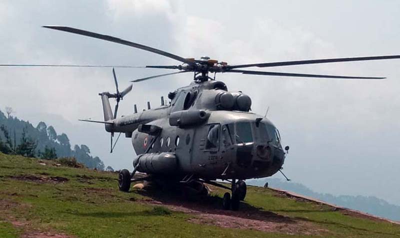 An army helicopter air-drops ration in Bamag area of Reasi on Monday.-Excelsior/Romesh Mengi