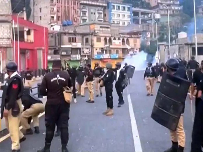 A view of violent clash between security forces and protesters in Muzaffarabad, PoJK on Monday.