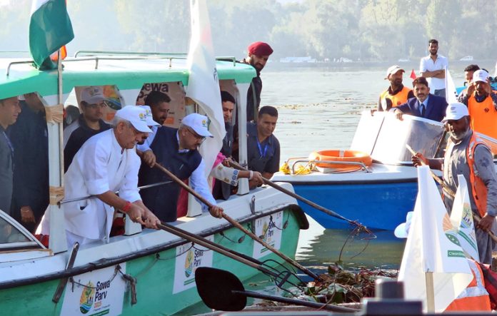 LG Manoj Sinha during the Dal lake cleanliness drive in Srinagar on Sunday. - Excelsior/Shakeel