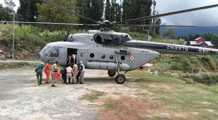 An Indian Air Force helicopter airlifts critical patients in remote area of Latti in Udhampur on Saturday. — Excelsior/K Kumar An Indian Air Force helicopter airlifts critical patients in remote area of Latti in Udhampur on Saturday. — Excelsior/K Kumar