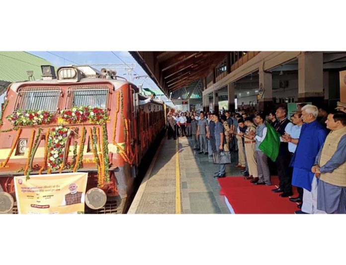 LG Manoj Sinha flagging off parcel train service from Nowgam Railway Station on Monday. -Excelsior/Sajad Dar