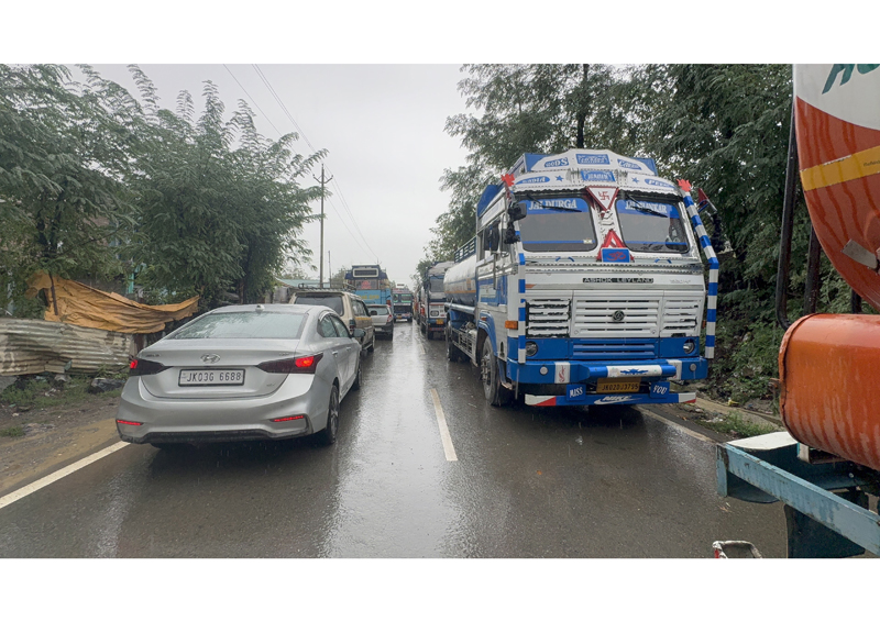 Traffic suspension on Jammu-Srinagar National Highway due to heavy rainfall. -Excelsior/Sajad Dar