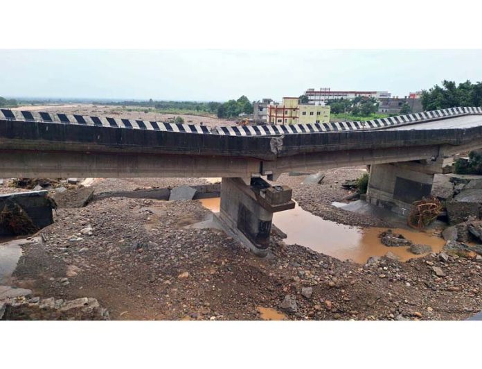 Damaged Sahar Khad bridge on Jammu-Pathankot National Highway near Kathua. -Excelsior/Pardeep Damaged Sahar Khad bridge on Jammu-Pathankot National Highway near Kathua. -Excelsior/Pardeep