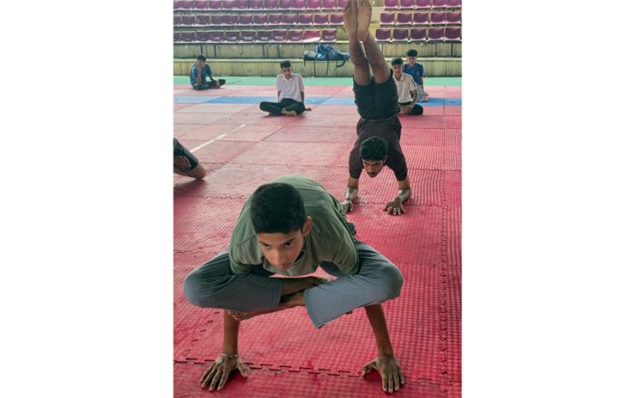 Boys competing in Yoga competition organized by DYSS in Jammu. Boys competing in Yoga competition organized by DYSS in Jammu.