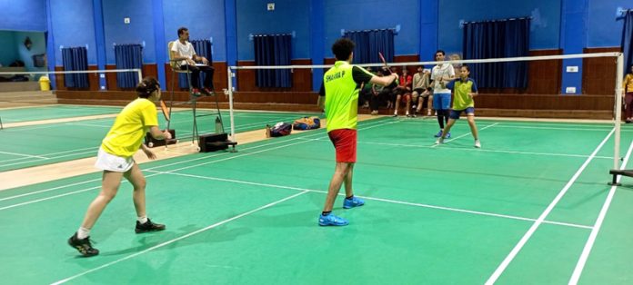 Players in action during a mixed doubles match at MA stadium Jammu.